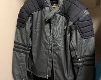 black and grey armored motorcycle jacket features Thinsulate thermal insulation and distinctive padded shoulders
