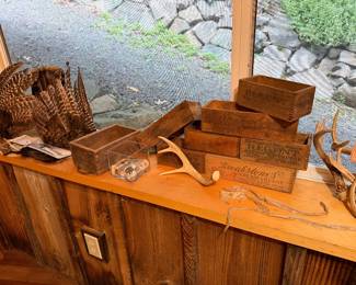 vintage wooden dairy crates, specifically branded as Breakstone's cream cheese and Regent dairy products