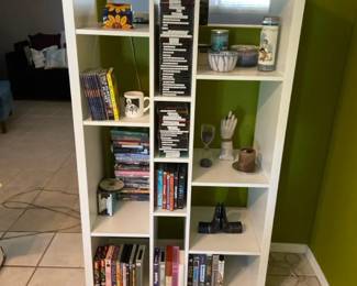 One Piece MultiShelf Stand With Decor And DVDs And Tapes