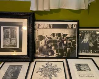 A Lot Of Framed Black And White Print Pictures