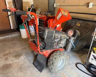 DR field and brush mower with chipper attachment