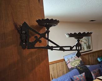 Cast iron wall sconce