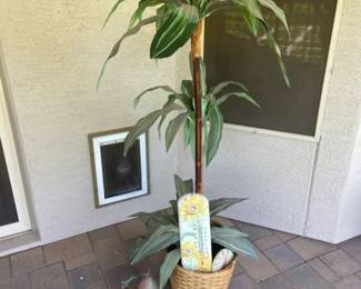 Faux Plant, Temperature Gauges, And Wind Chime
