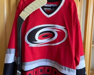 Carolina Hurricanes Hockey Jersey And Hockey Stick