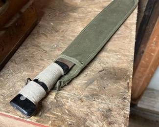 569 militarystylemachetewithcordwrapped