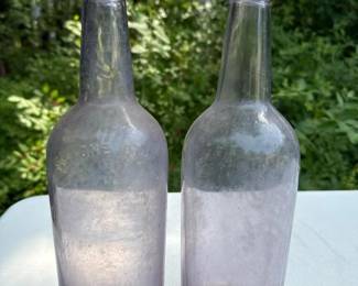 223 pairofamethystglassbottles