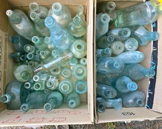 149 lotofantiqueembossedglassbottles