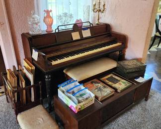 1940's Wurlitzer piano, console stereo (does not work), vintage magazine rack, upholstered foot stool