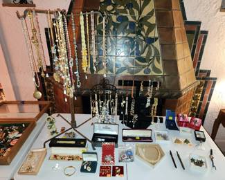 Costume jewelry, sterling jewelry, fountain pens, and other collectibles