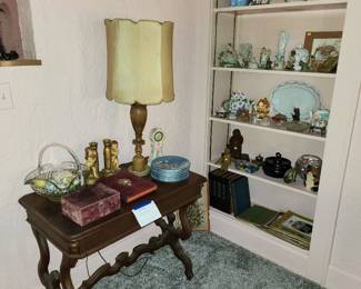 Antique library table, lots of figurines and other collectibles / decorative items