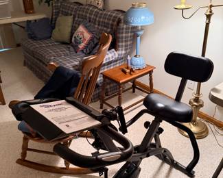 Exercise Bike and Wicker Sofa