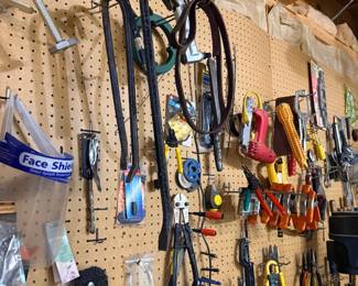 Pegboard wall of hand tools and hardware