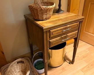 Vintage sewing cabinet table with baskets and lamp