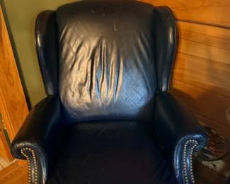 Black leather recliner with nailhead trim