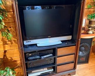 Wood entertainment center armoire with TV