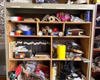 Hardware shelf with tape, fasteners, supplies
