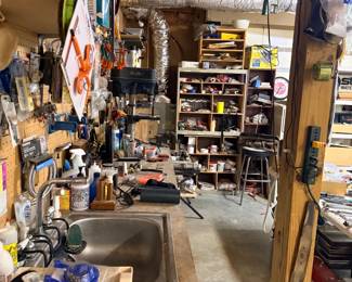 Workshop with utility sink and hardware organizers