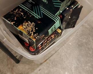 Tote of LED light fixtures in boxes