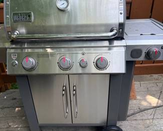 Weber stainless steel gas grill with side burner