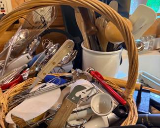 Basket of assorted kitchen utensils and gadgets