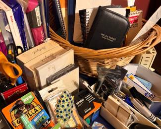 Basket of notebooks and office supplies