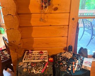 Costume jewelry display tables with necklaces