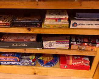 Books and vintage board games including Pictionary