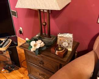 Nightstand with table lamp and clock