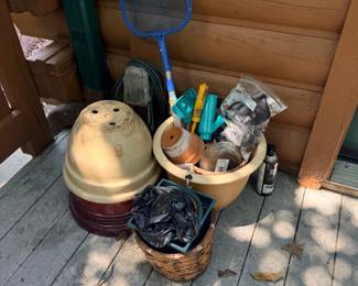 Garden planters, pool net, and outdoor items