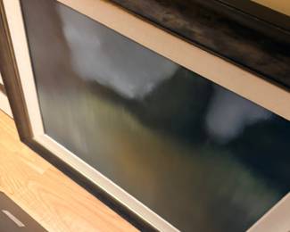Framed art with dark wood frame