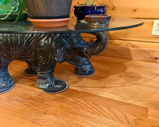 Elephant base glass top side table