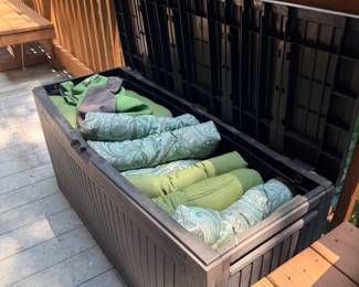 Outdoor deck storage box with cushions