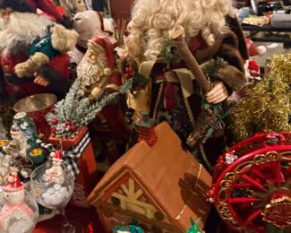 Collectible Santa figures and Christmas snow globes