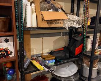 Shelf of party supplies and serving trays