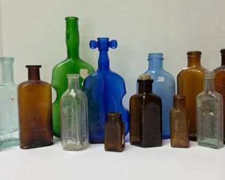 Variety of Vintage Colored Bottles