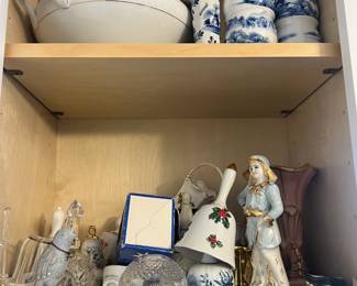 A collection of porcelain bells. 