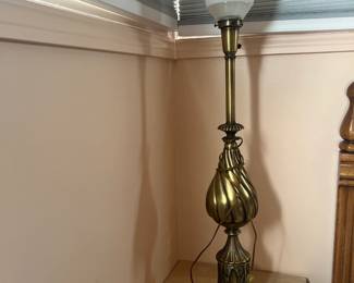 Hollywood Regency torchiere table lamp from the 1950s. There are 2. These are rare and in a stunning condition.