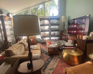 A vintage adjustable ratchet fruitwood floor lamp with shade. MCM United Sculpted Low Boy dresser with saber tooth handles.