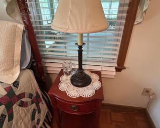 Vintage Table Lamp with Shade - A classic vintage table lamp featuring a pleated shade and a sturdy base, perfect for bedside or living room use.