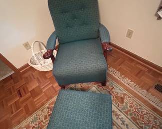 Vintage Recliner Chair with Ottoman - A comfortable vintage recliner chair featuring a blue patterned fabric and a matching ottoman. Ideal for relaxation in any room.