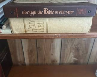 Through the Bible in One Year and Holy Bible - This listing includes 'Through the Bible in One Year' and a classic Holy Bible. Perfect for study or personal use.
