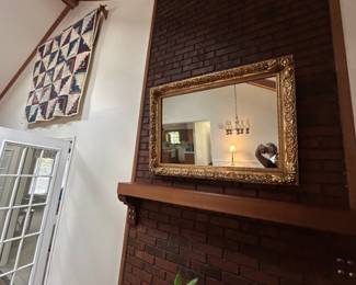 Vintage Ornate Gold Framed Mirror - Beautiful vintage mirror with an ornate gold frame, perfect for adding elegance to any room.