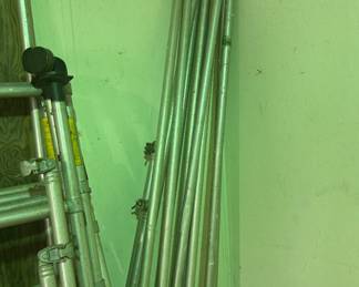 Aluminum Scaffolding Poles - Set of aluminum scaffolding poles ideal for construction or renovation projects. Durable and lightweight for easy handling.