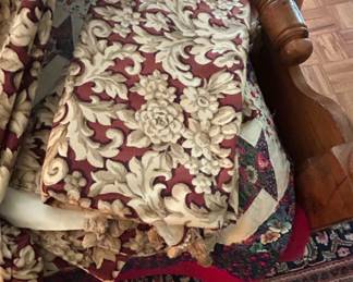 Elegant Floral Patterned Fabric - This beautiful table cover and curtain set was sewn by hand. The fabric features an intricate floral design in rich burgundy and cream tones, perfect for upholstery or crafting.