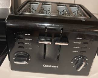 Cuisinart 4-Slice Toaster - This Cuisinart 4-slice toaster features multiple settings for bagels, defrosting, and reheating. It's perfect for making breakfast quick and easy.