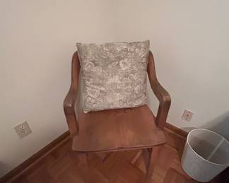 Wooden Chair with Decorative Cushion - A charming wooden chair featuring a decorative cushion, perfect for any room.