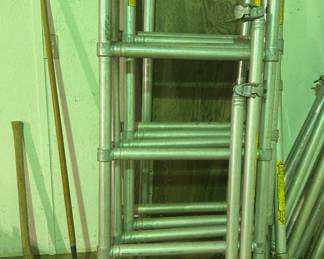Aluminum Folding Ladder - A sturdy aluminum folding ladder, ideal for various home and work projects. Lightweight and easy to store.