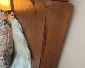 Vintage Wooden Bed Headboard - A beautifully crafted vintage wooden headboard with detailed carvings. Perfect for adding a classic touch to any bedroom.