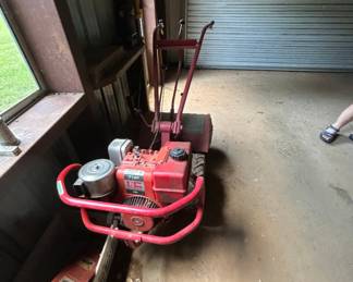 Vintage 7 HP Gas Powered Tiller - This vintage gas-powered tiller features a 7 HP engine and is ideal for garden preparation. It's in good working condition and ready for your gardening needs.