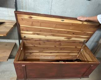 Vintage Wooden Chest with Hinged Lid - This vintage wooden chest features a hinged lid and a rustic finish, perfect for storage or as a decorative piece.